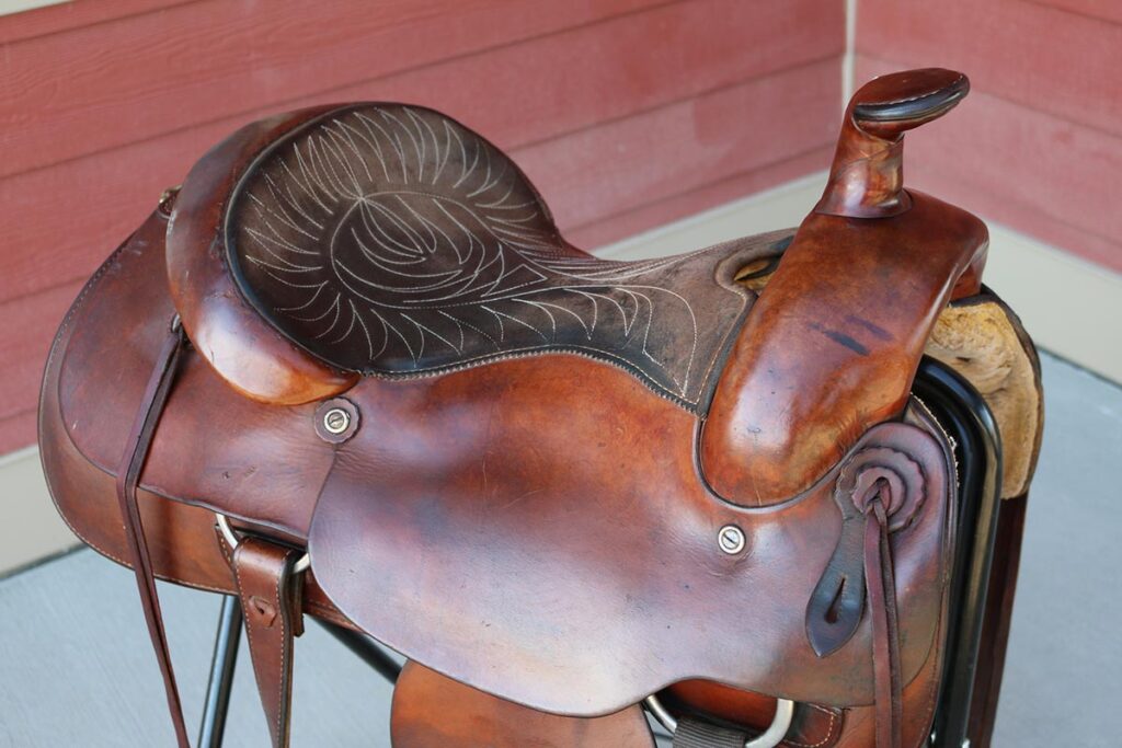 A close-up of a horse's western saddle