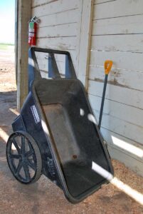 a wheelbarrow for mucking out horse stalls