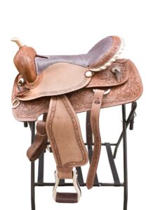 a brown leather western saddle with a white background