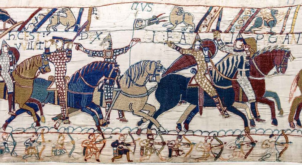 A portion of the Bayeux Tapestry showing horses being ridden into battle
